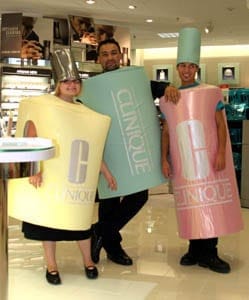 Katrina Kirkland, Naia Folidei and Rory Sepulveda pose in costumes designed as popular Clinique Cosmetics products at the grand opening of the Meier & Frank in Riverdale. The one-story department store is the eighth in Utah to open and is expected to generate between $200,000 and $300,000 in annual sales tax revenue to the city. (Robert Hirschi/The Salt Lake Tribune)